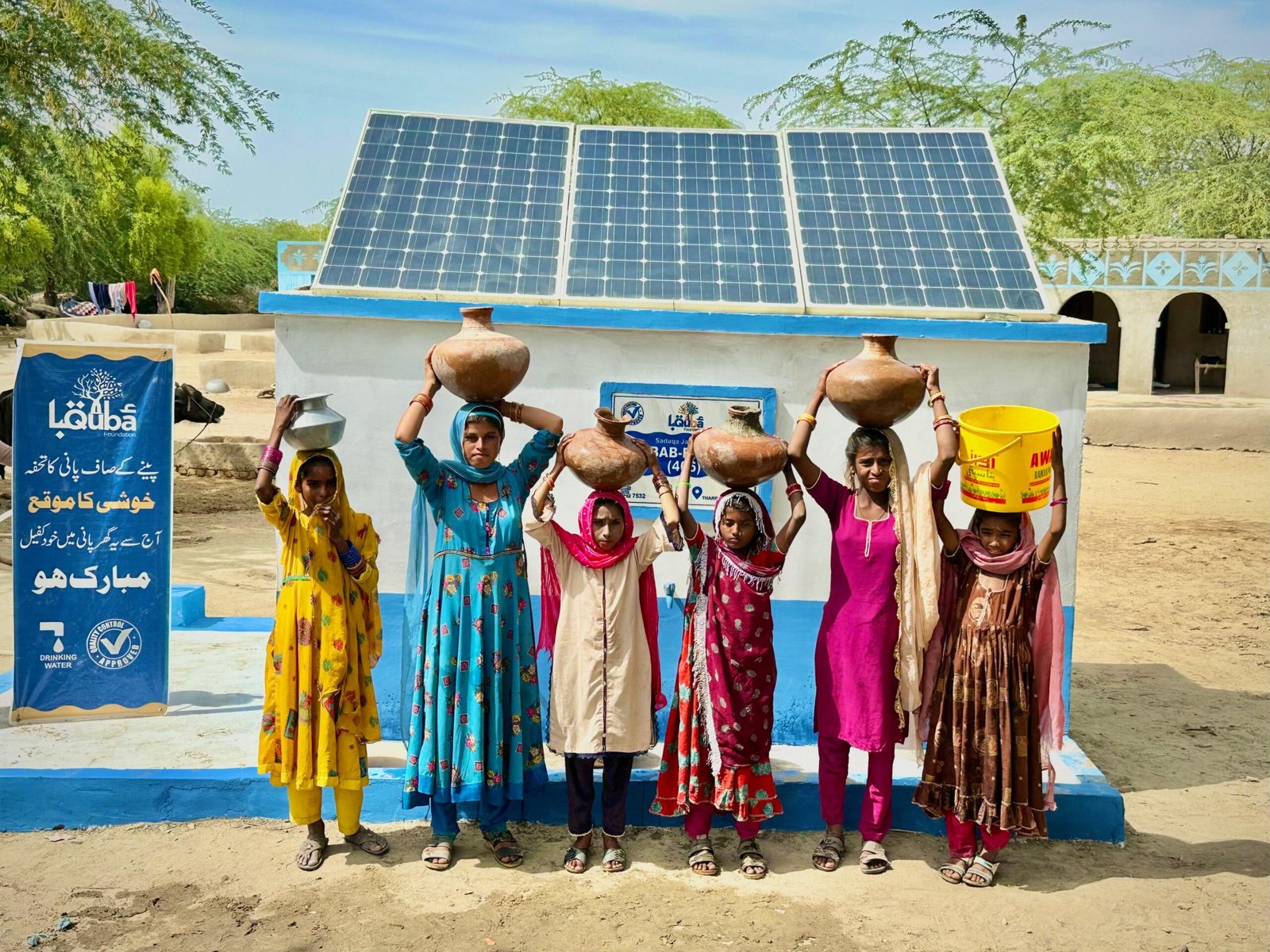 A happy womens looking happy after installation of Solar Project