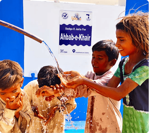 Children are looking happy to see water through Water Project