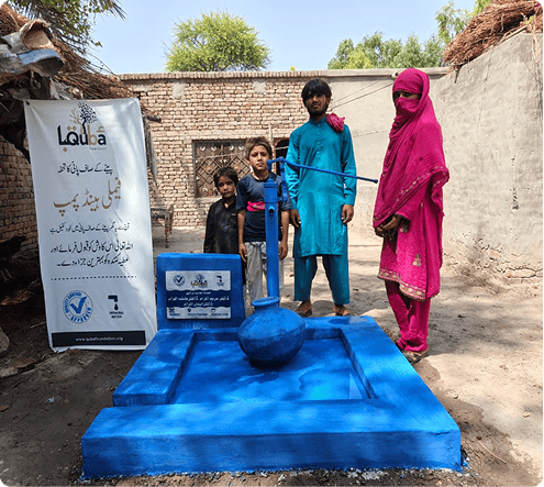 Family with Famil Water Hand Pump Installation